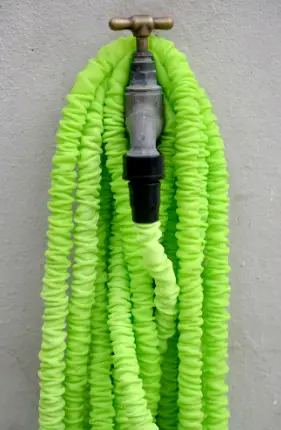 Expandable garden hoses shrink to a more manageable size.